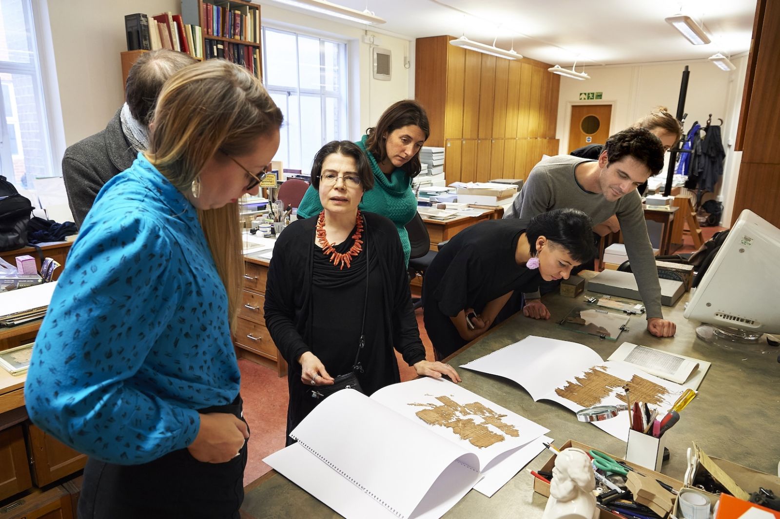 he Fragments creative team are shown around the Oxyrhynchus collection by curator Dr Daniela Colomo. 