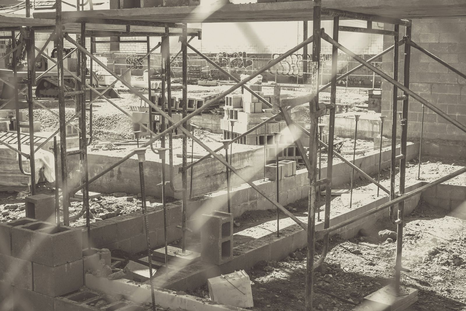 scaffolding and construction site in black and white