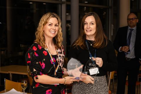 Keely and Kendal with the glass award