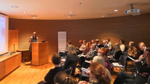 Dr Lis Bates speaking at a launch event