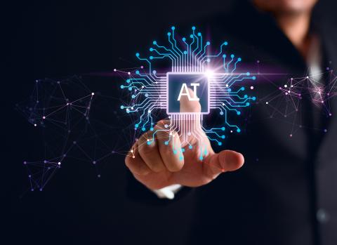 Black background with hand reaching and and touching AI icon
