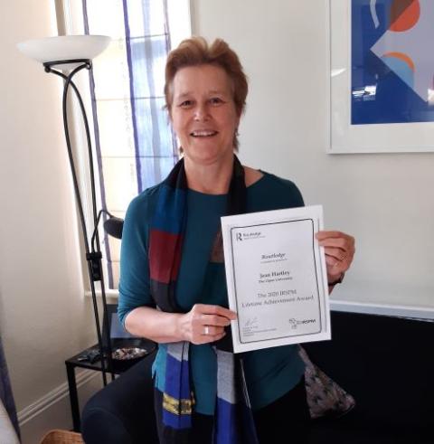 Jean Hartley holding her certificate