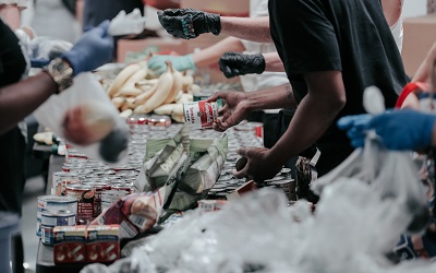 Photo by Joel Muniz on Unsplash - image shows a food bank