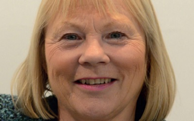 Photo of Dr Ann Limb smiling at the camera. She has blonde hair with a fringe and blue eyes. She looks happy and relaxed.