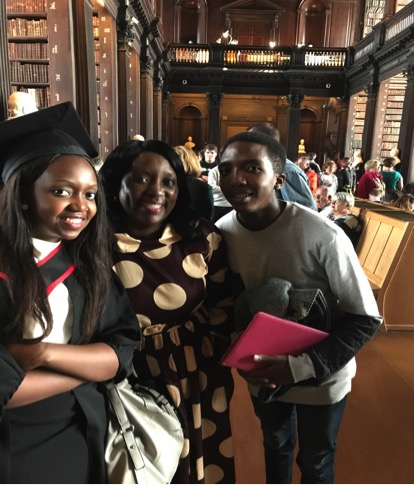 Photo of DPP Associate Jesimen (centre) with two of her children