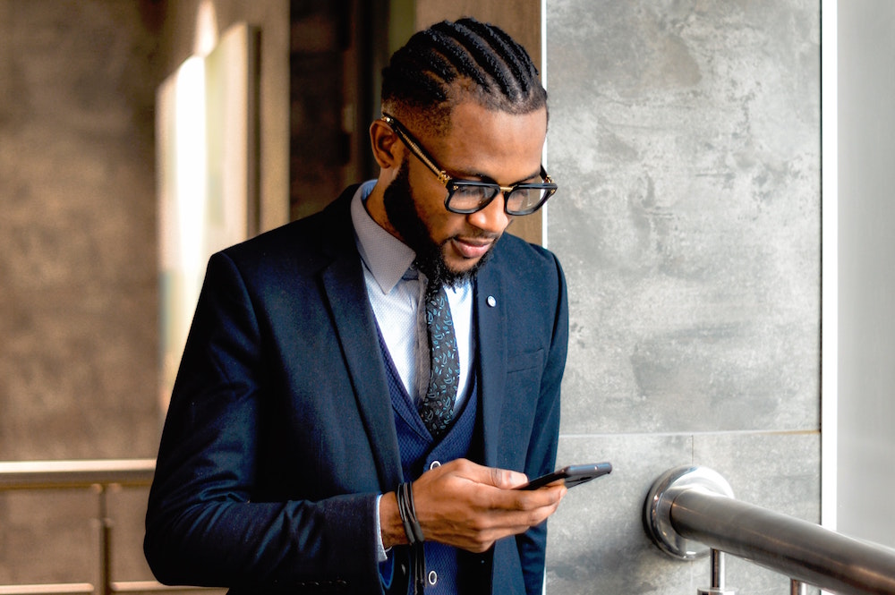 Photo of businessman using mobile