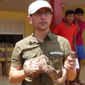 Andrea Berardi with boa constrictor image