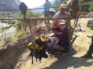 Photo of Kirsteen Merrillees crossing the river on a ropeway