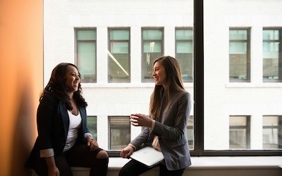 two women in conversation