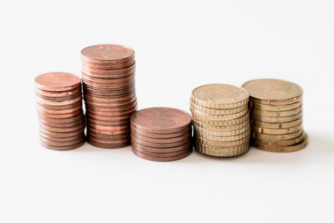 Stacks of coins laid out next to each other