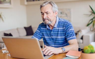 Older gentleman using a laptop. Acknowledgement:  RgStudio/iStock/Getty Images Plus