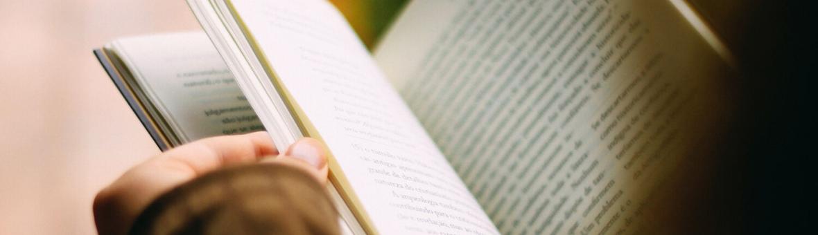 Hands holding a book