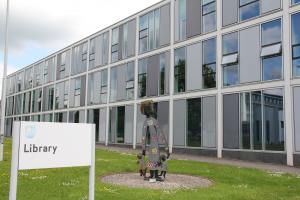 The Library at Walton Hall, including the sculpture outside