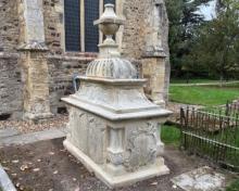 Restored tomb in front of St Michael's church
