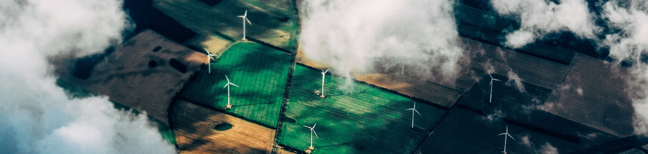 A birds eye view of wind turbines in the countryside