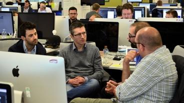 Computing and IT students gaining an insight into projects undertaken by Software Engineers within the CompoZed team. From Left to right: Glenn McGoldrick, Garrett Vernon and Allstate Software Engineers