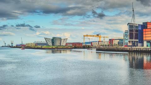 the landscape of Belfast docks with Titanic Belfast, the Harland and Wolfe cranes and the SSE Arena