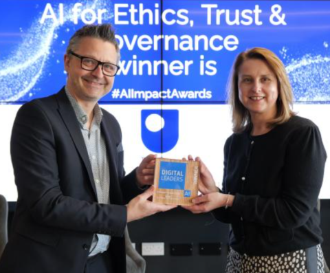 Francine accepting AI award