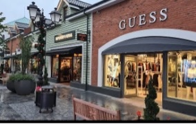 Shop fronts at Macarthur Glen Designer Outlets