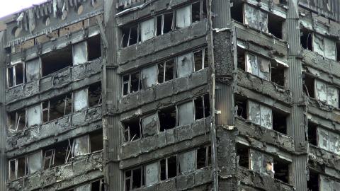 Close up of the charred remains of the Grenfell Tower apartment block.
