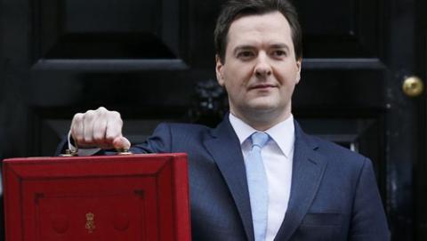 A white man holding a red briefcase.