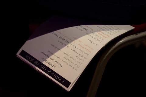 An itinerary for the 'A Matter of Life and Death' conference printed on a white sheet of paper.