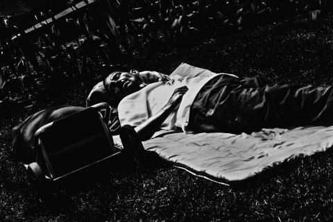 Image of a homeless man sleeping in a park in Canada https://www.123rf.com/photo_31129604_14-may-2014-montreal-canada-homeless-person-sleeping-at-downtown-park-during-the-day-the-financial-c.html