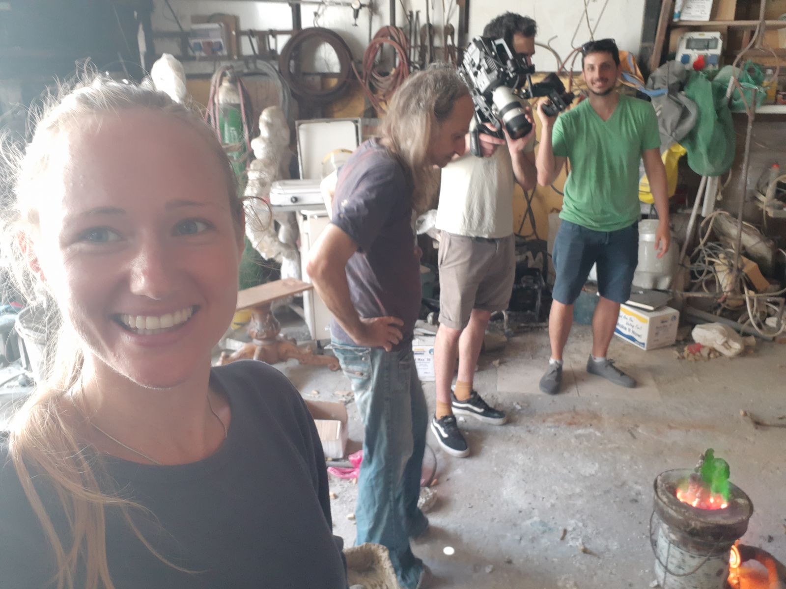 Bea Baharier and team filming in her father's workshop