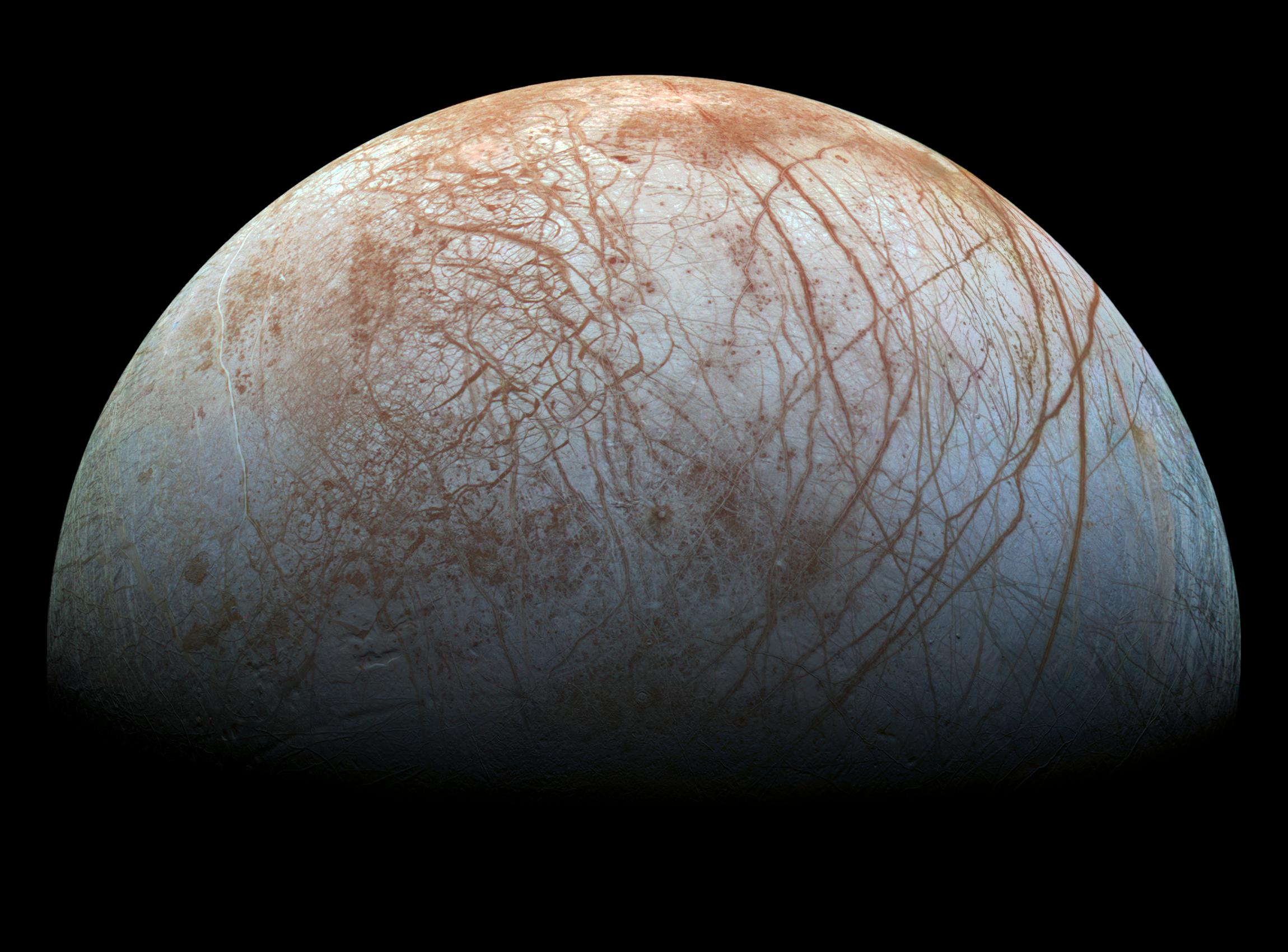 Europa, an icy moon with brown stripes