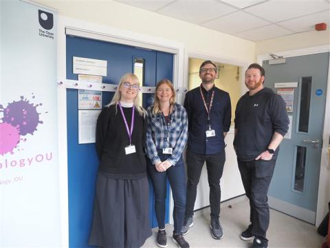 Icy worlds team at lab door