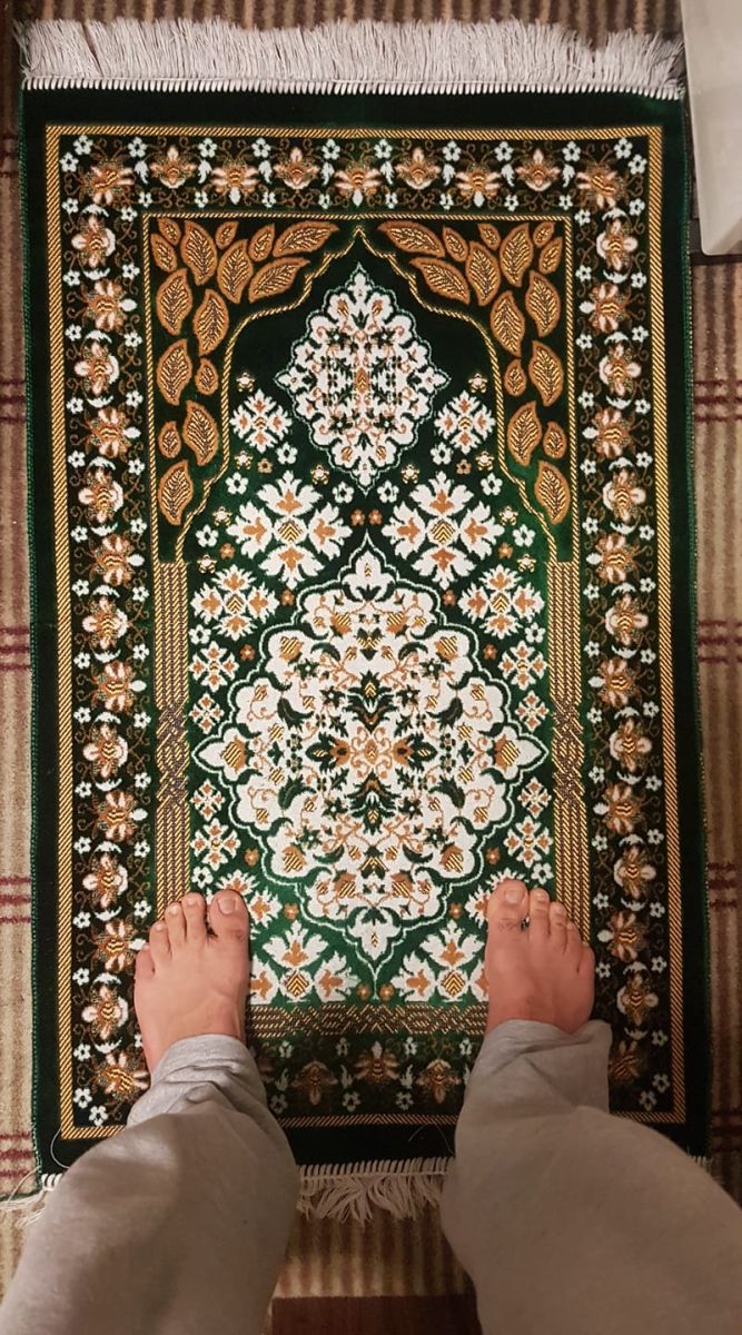 Image of feet of prayer mat