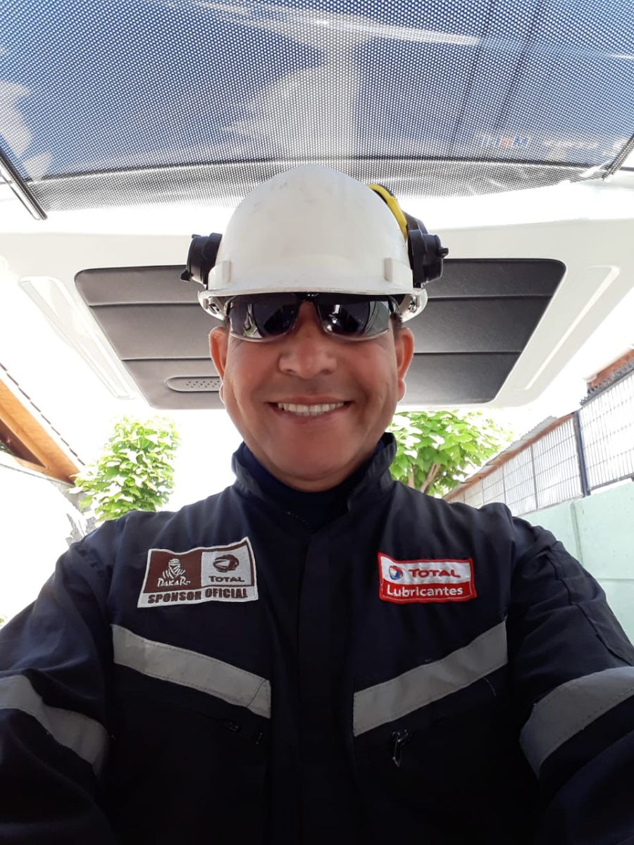Man in hard hat and safety jacket