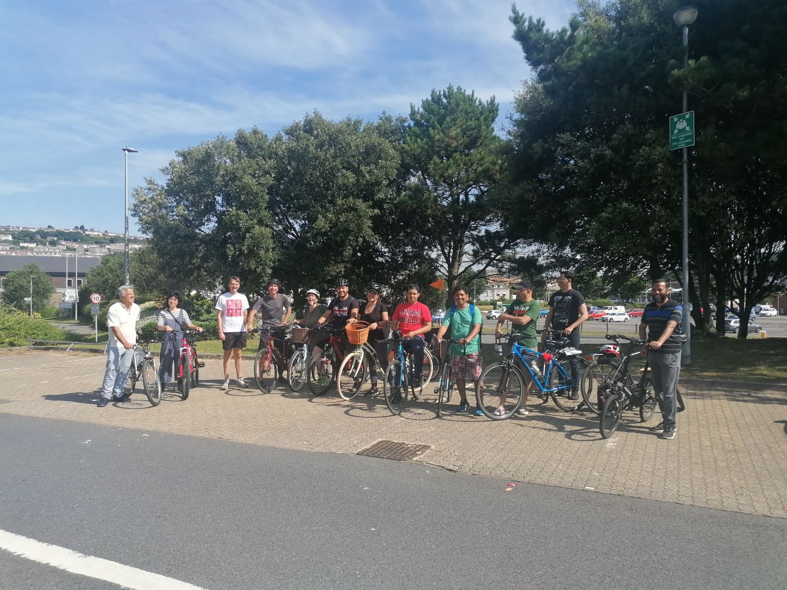 Group photo of asylum seekers and refugees riding in South Wales