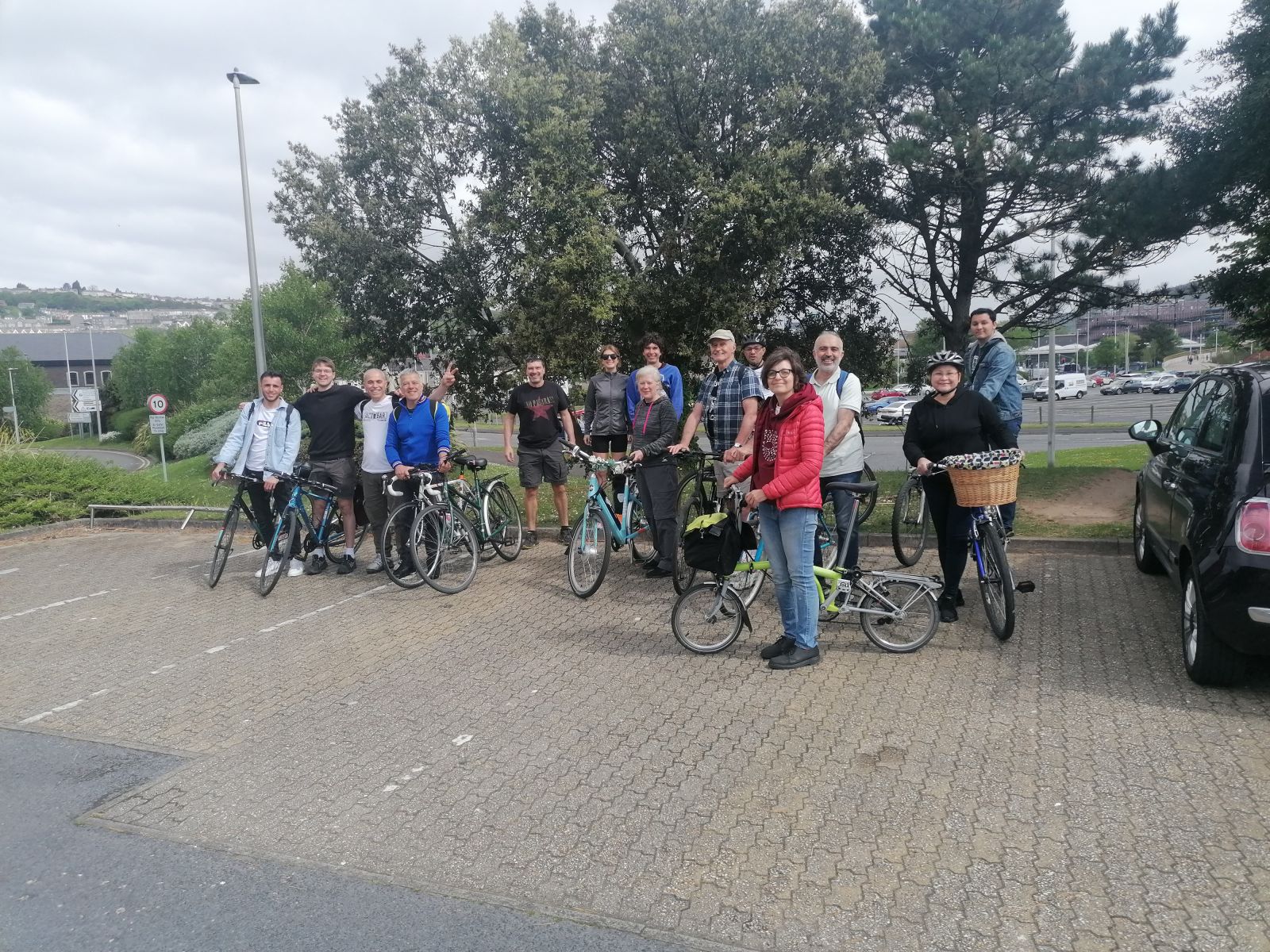 Group photo of asylum seekers and refugees riding in South Wales