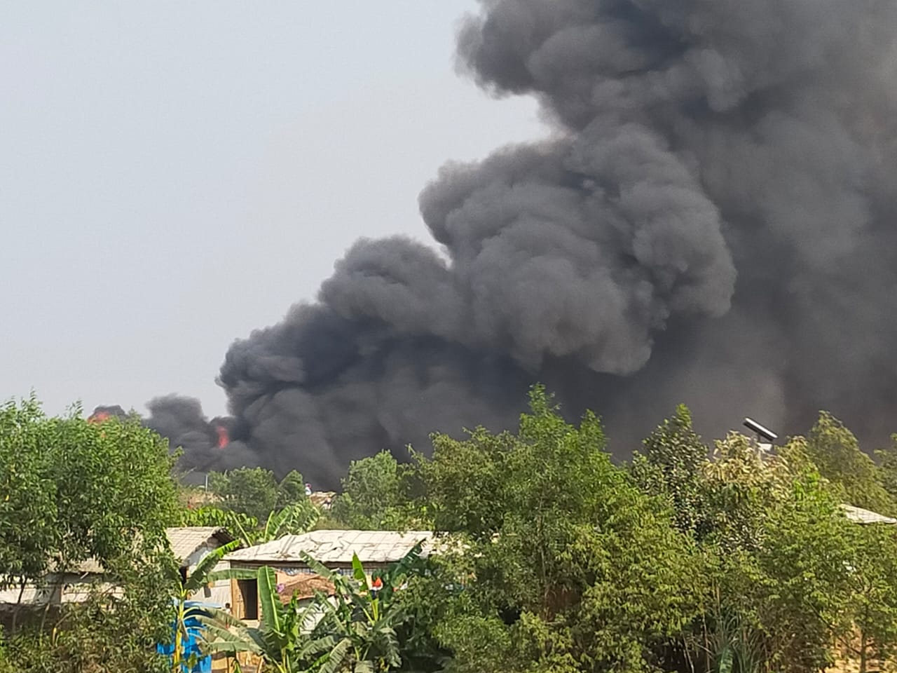grey smoke from burning