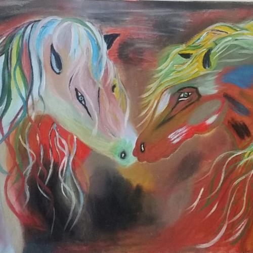 Two colourful horses with long manes rest their heads towards each other