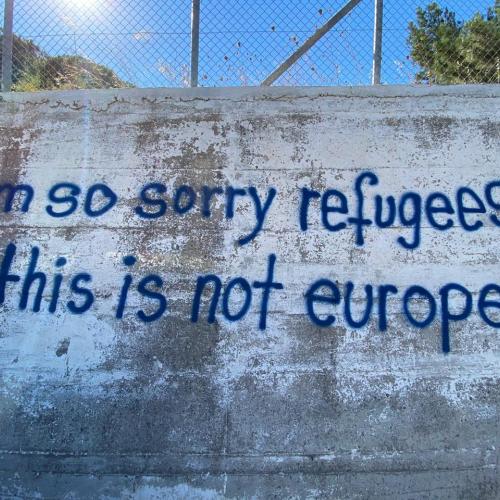 a wall graffiti "I am so sorry refugees, this is not europe"