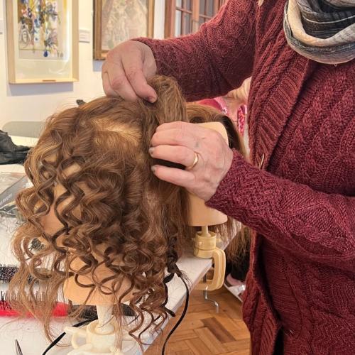 Asylum Seeker girl getting hair done