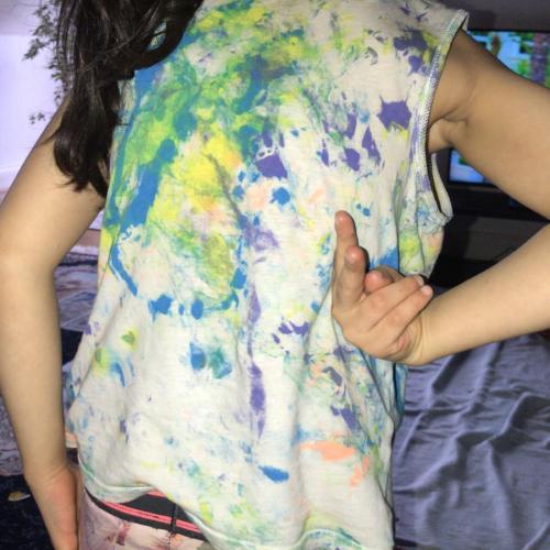 back of a painted t-shirt, wore by a girl