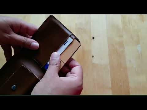a hand on a purse