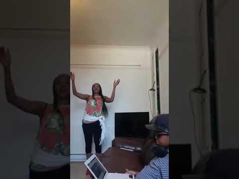 Kenyan lady dancing Latin indoor