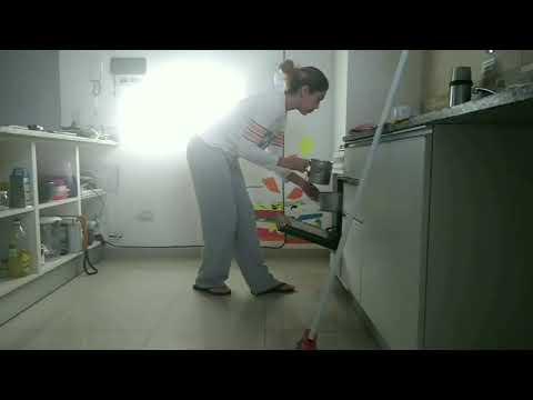 Lady opening oven