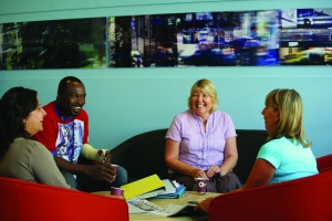 Group of people sitting and chatting