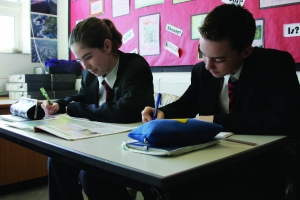 School children working in a classroom