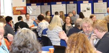 Conference delegates working in groups