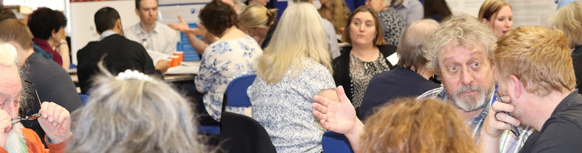 Conference delegates working in groups