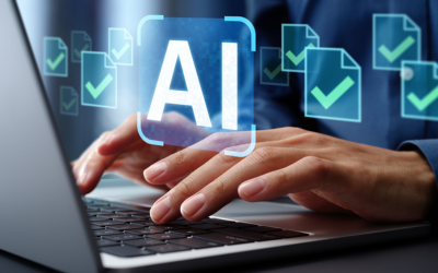 Hands typing at a laptop with an icon representing AI floating outside the laptop
