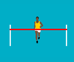 person running to a finish line 