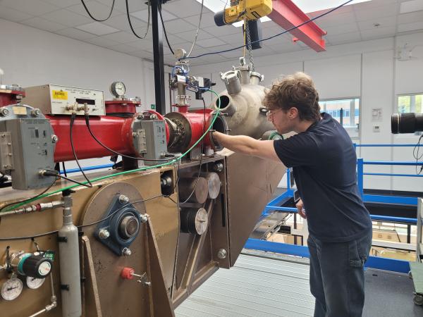 Student Finlay Price positioning his target within the AALGG small chamber