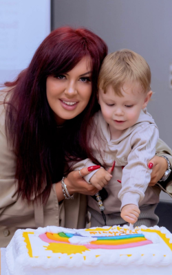 OU graduate Naomi Brown and her son
